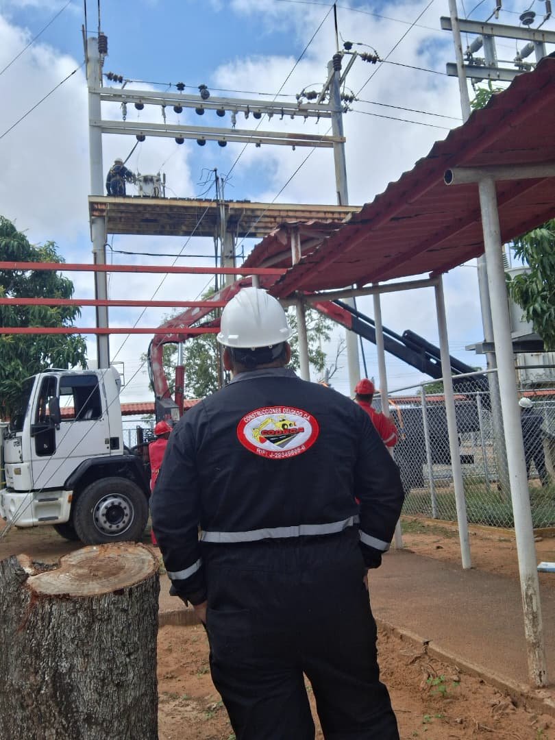 CODECA supervisor overseeing work at an electrical substation